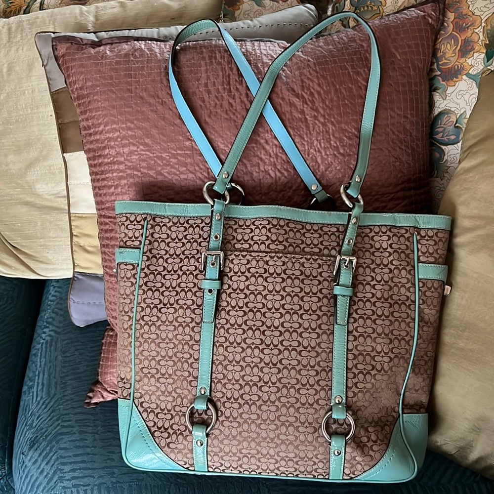 COACH: Signature “C” canvas tote with blue green leather trim